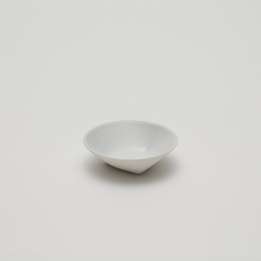 Porcelain espresso saucer or small bowl designed by Christian Haas for Arita 2016. Handemade in Japan. Glazed interior, matte white exterior. Thin profile, contemporary ceramics.