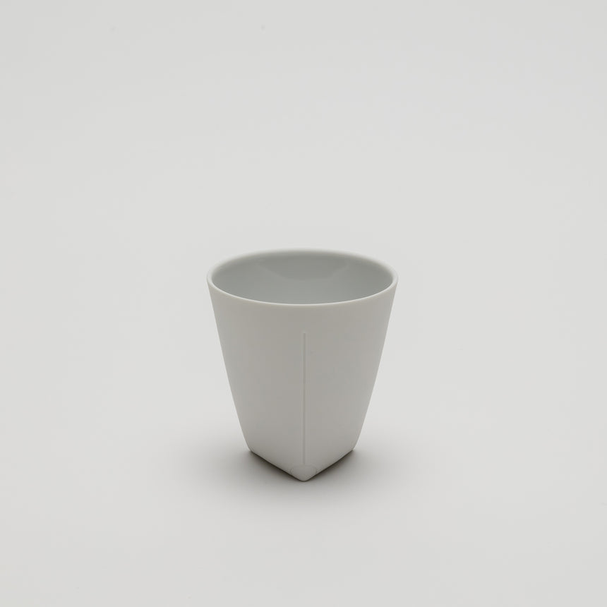 White ceramic coffee cup designed by Christian Haas in Arita, Japan. High quality porcelain. Matte finish.