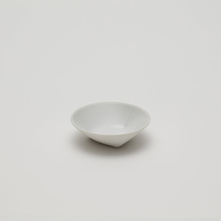Porcelain espresso saucer or small bowl designed by Christian Haas for Arita 2016. Handemade in Japan. Glazed interior, matte white exterior. Thin profile, contemporary ceramics.