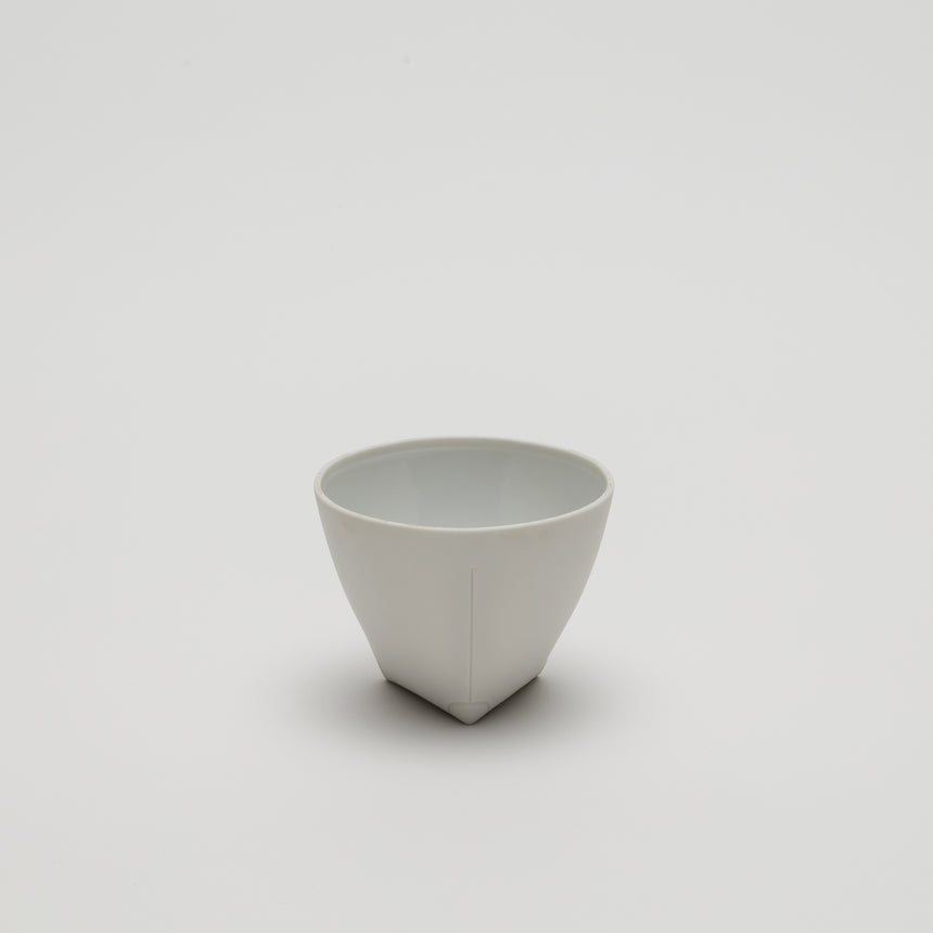 White porcelain coffee cup designed by Christian Haas for Arita 2016. White glazed interior, matte white exterior with a triangular base and circular lip. Thin walled contemporary ceramics.